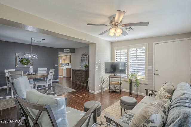 living room with ceiling fan