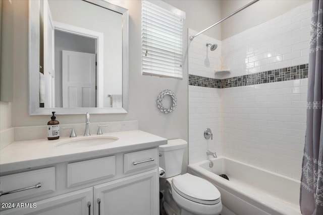 full bathroom with vanity, toilet, and shower / bathtub combination with curtain