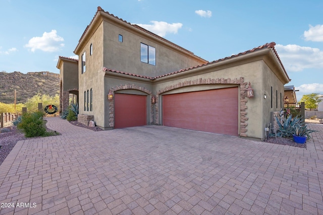 mediterranean / spanish-style house featuring a mountain view