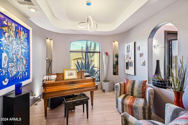 miscellaneous room featuring a tray ceiling