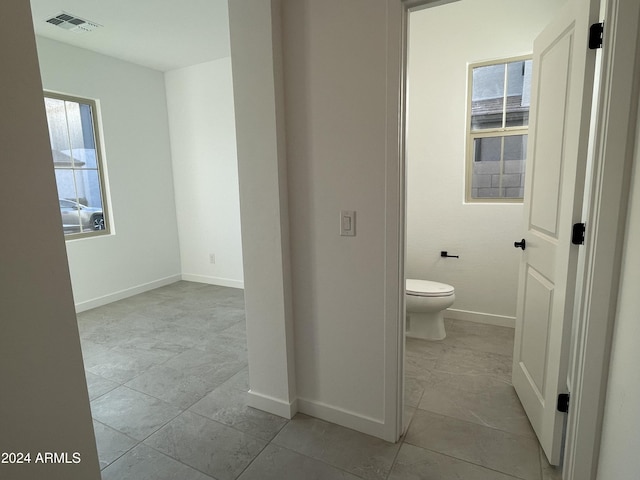 bathroom featuring toilet