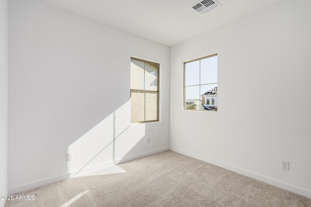 view of carpeted spare room