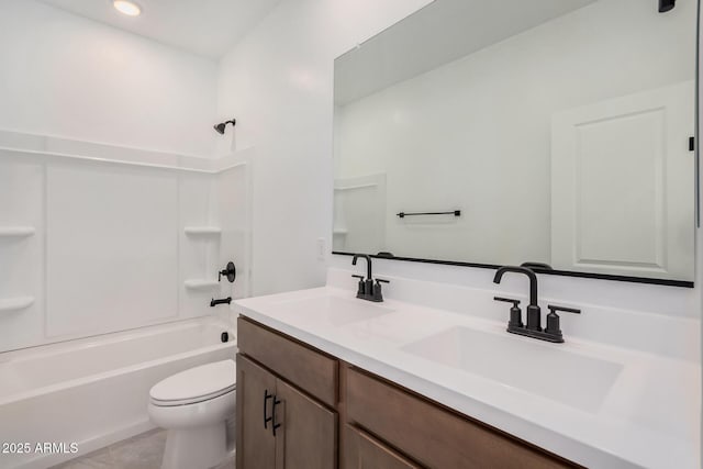 full bathroom with vanity, tub / shower combination, and toilet