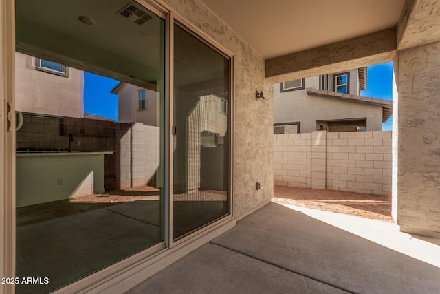 exterior space featuring concrete flooring