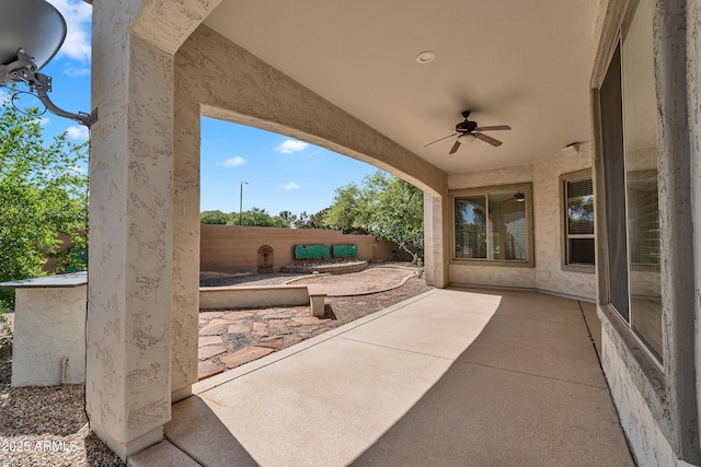 view of patio / terrace featuring ceiling fan and a fenced backyard
