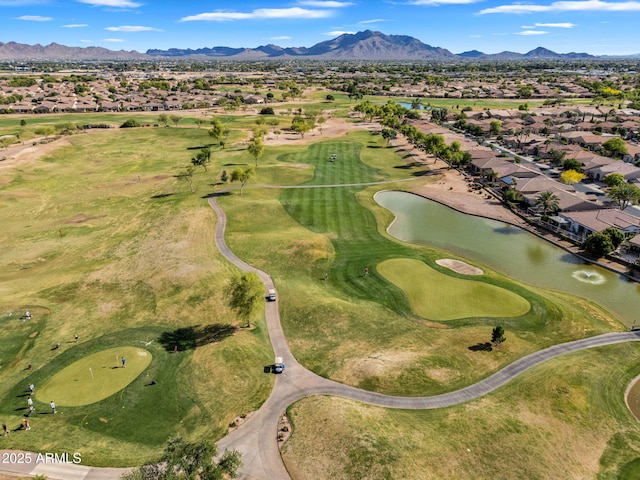 bird's eye view featuring a residential view, view of golf course, and a water and mountain view