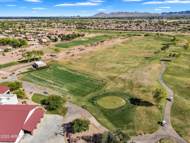 birds eye view of property featuring a residential view, a mountain view, and view of golf course