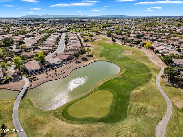 bird's eye view with a water and mountain view and a residential view