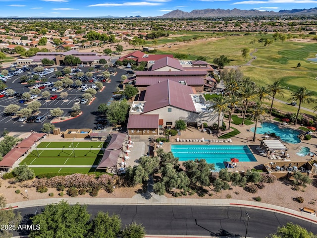 birds eye view of property featuring a mountain view and golf course view