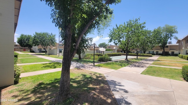 view of road featuring a residential view and sidewalks