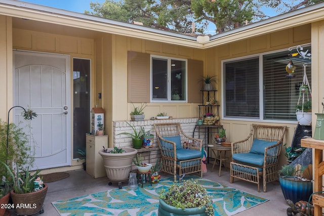 property entrance featuring a patio