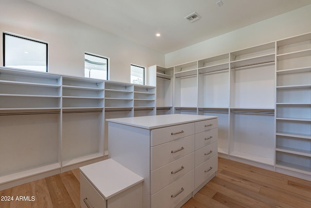 spacious closet featuring light wood-type flooring