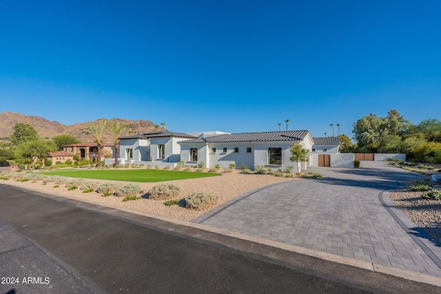 view of front of home with a mountain view