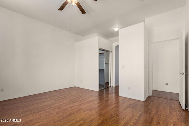unfurnished bedroom with wood finished floors and ceiling fan