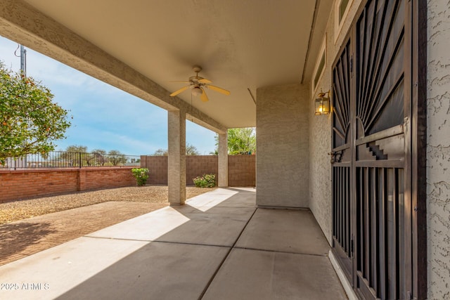 view of patio / terrace with ceiling fan and a fenced backyard