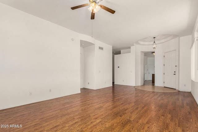 interior space featuring visible vents, wood finished floors, and ceiling fan