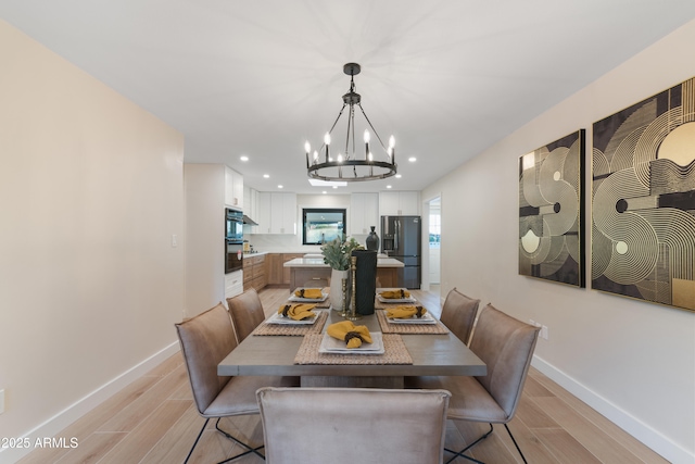 dining area with a notable chandelier