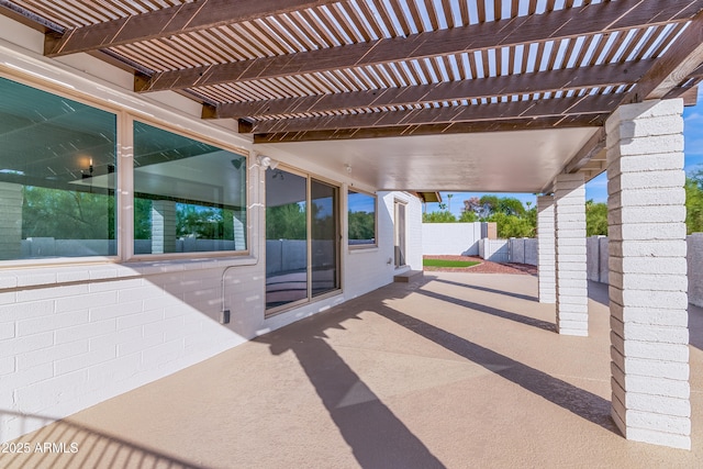 view of patio featuring a pergola