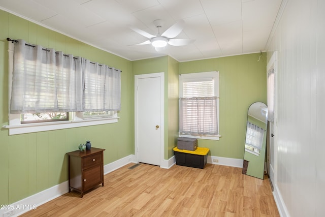 24 Black Knob Vw, Bisbee, AZ 85603 - miscellaneous room featuring crown molding, light wood-type flooring, a ceiling fan, and baseboards
