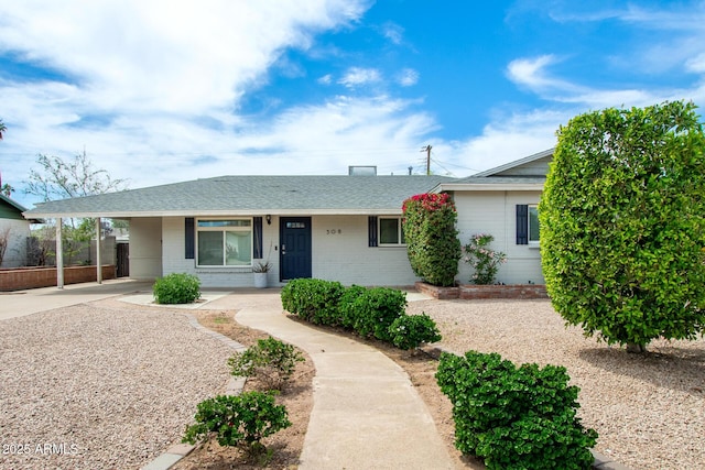 508 S Ernie Pl, Tempe, AZ 85281 - ranch-style house with a shingled roof, an attached carport, driveway, and brick siding