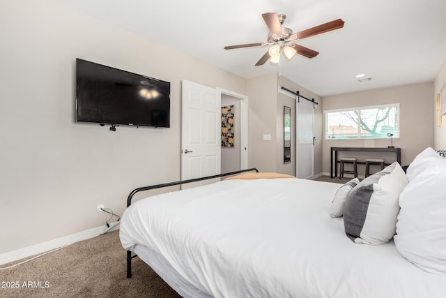 508 S Ernie Pl, Tempe, AZ 85281 - bedroom featuring carpet floors, baseboards, a barn door, and visible vents