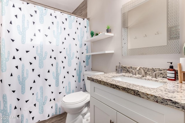 508 S Ernie Pl, Tempe, AZ 85281 - full bathroom with vanity, a shower with curtain, toilet, and wood finished floors