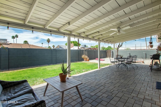 508 S Ernie Pl, Tempe, AZ 85281 - view of patio featuring a fenced backyard, outdoor dining space, ceiling fan, and central AC