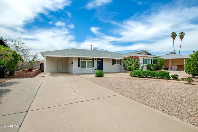508 S Ernie Pl, Tempe, AZ 85281 - single story home featuring an attached carport, driveway, and brick siding