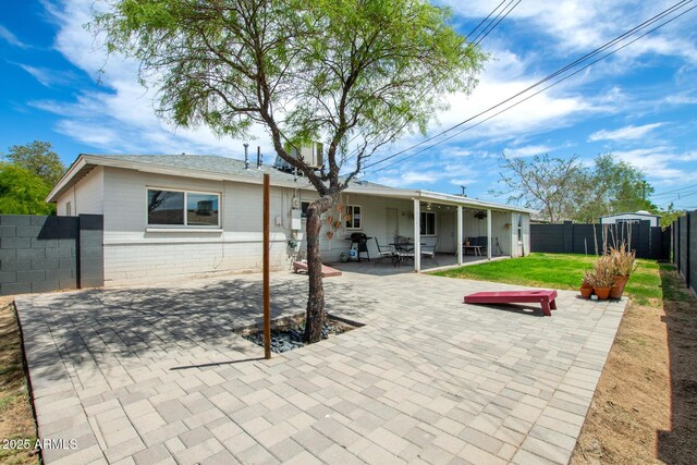 508 S Ernie Pl, Tempe, AZ 85281 - rear view of property with a fenced backyard and a patio