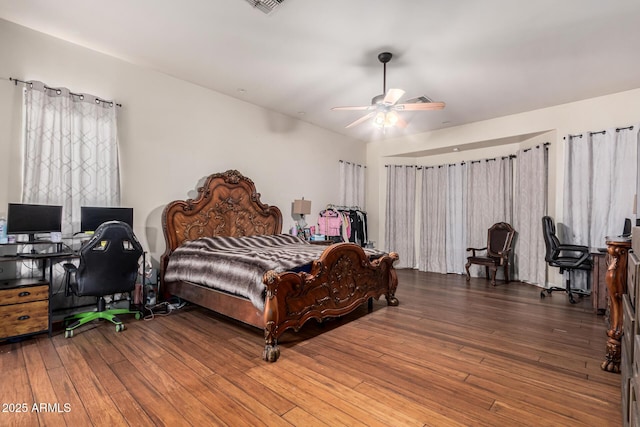 bedroom featuring ceiling fan and wood-type flooring