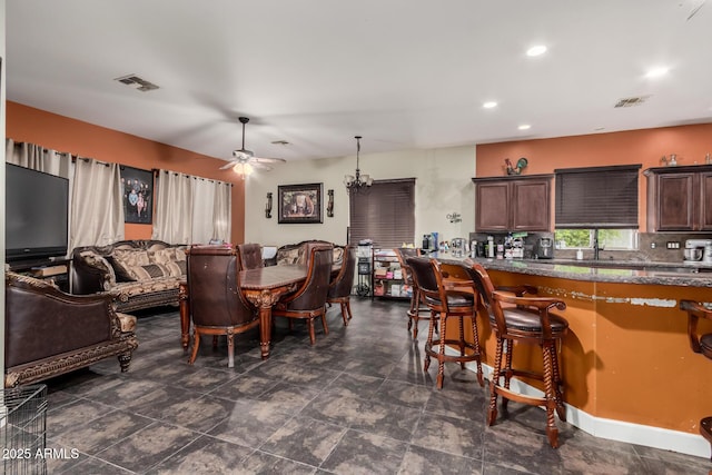 dining space with recessed lighting, visible vents, and ceiling fan