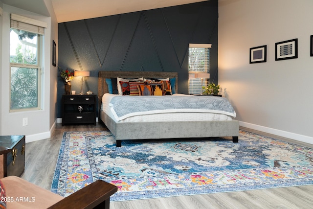 136 E Vera Ln, Tempe, AZ 85284 - bedroom featuring wood finished floors and baseboards