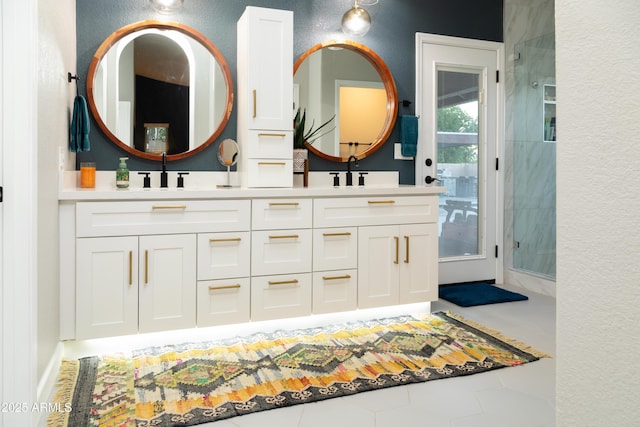 136 E Vera Ln, Tempe, AZ 85284 - full bathroom featuring a stall shower, double vanity, and tile patterned flooring