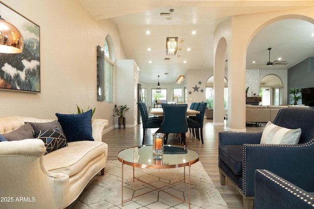 136 E Vera Ln, Tempe, AZ 85284 - living room with arched walkways, a ceiling fan, wood finished floors, and recessed lighting