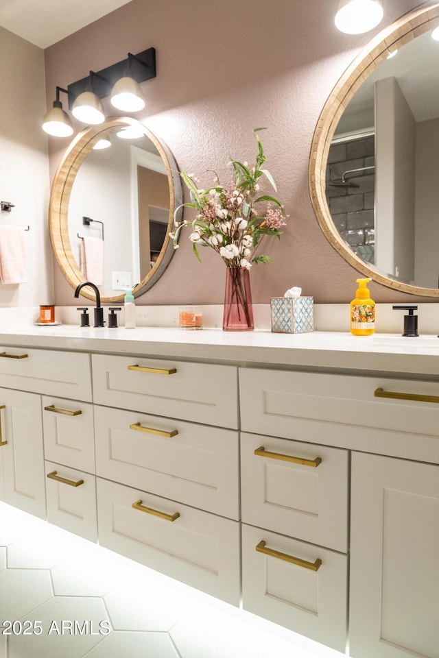 136 E Vera Ln, Tempe, AZ 85284 - full bathroom featuring double vanity and a textured wall