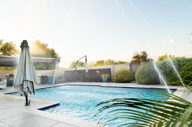 136 E Vera Ln, Tempe, AZ 85284 - view of swimming pool featuring exterior kitchen and a patio area