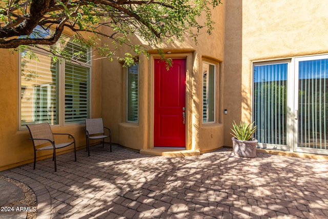 doorway to property featuring a patio