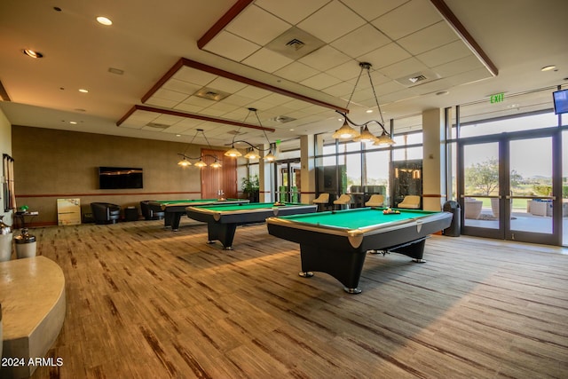 recreation room featuring french doors, a wall of windows, and pool table