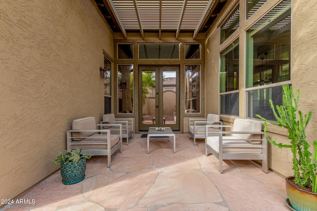 view of patio featuring french doors