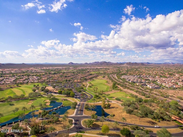 bird's eye view with a water and mountain view