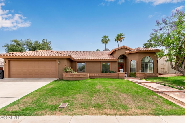 15430 N 19th Way, Phoenix, AZ 85022 - mediterranean / spanish home featuring an attached garage, driveway, a front lawn, stucco siding, and a tiled roof