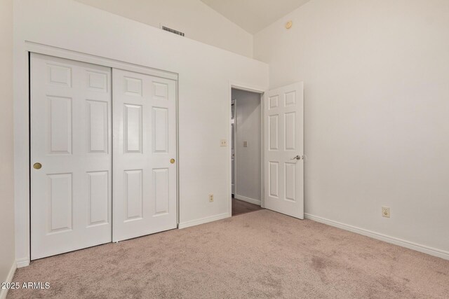 15430 N 19th Way, Phoenix, AZ 85022 - unfurnished bedroom with carpet, a closet, baseboards, and high vaulted ceiling