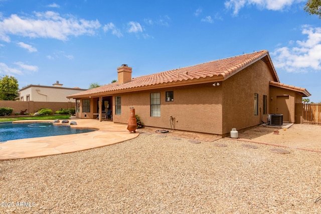 15430 N 19th Way, Phoenix, AZ 85022 - rear view of property featuring fence, stucco siding, central AC, a patio, and a tile roof