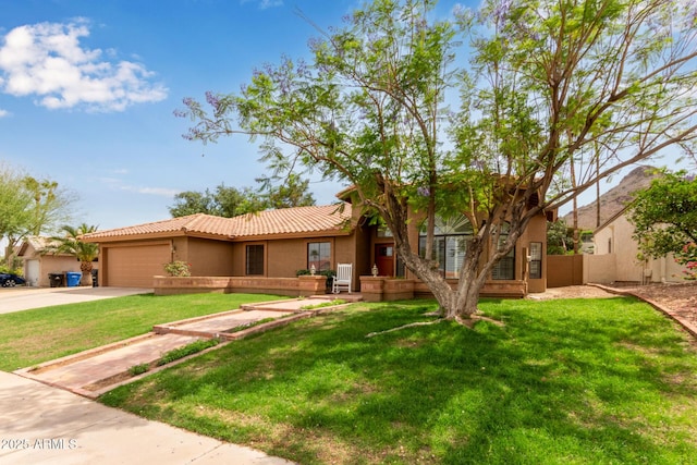 15430 N 19th Way, Phoenix, AZ 85022 - view of front of property featuring stucco siding, a tile roof, driveway, and a garage