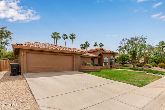 15430 N 19th Way, Phoenix, AZ 85022 - mediterranean / spanish home with stucco siding, a garage, concrete driveway, and a tile roof