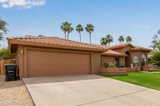 15430 N 19th Way, Phoenix, AZ 85022 - mediterranean / spanish-style home featuring an attached garage, stucco siding, and driveway