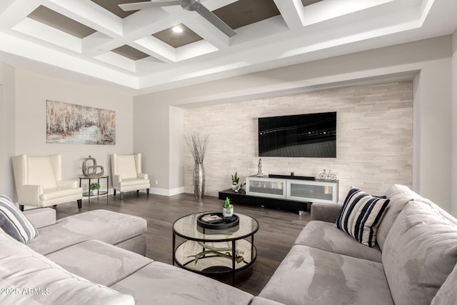 living room with baseboards, wood finished floors, a ceiling fan, beam ceiling, and coffered ceiling