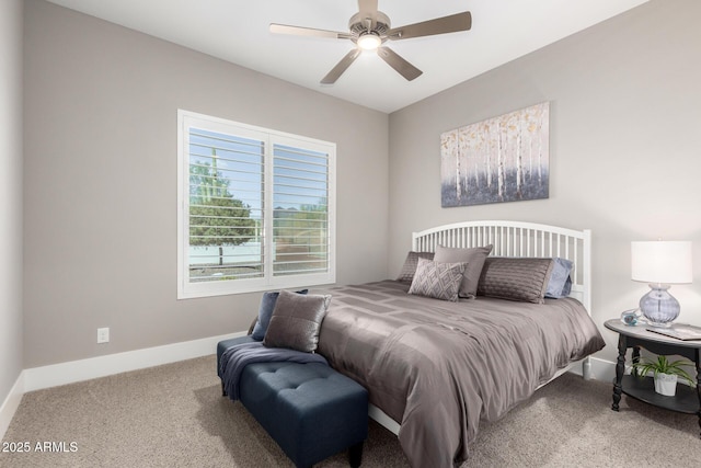 bedroom with baseboards, carpet, and a ceiling fan