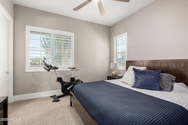 bedroom with baseboards, carpet floors, and ceiling fan