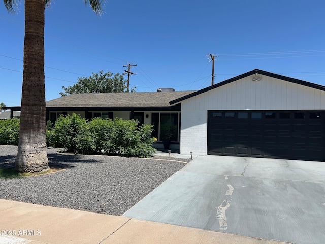 7802 E Hubbell St, Scottsdale, AZ 85257 - single story home with a garage, brick siding, and driveway